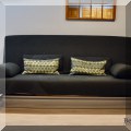 F48. One of two Ikea futons with storage. 